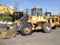 Фронтальный колесный погрузчик Caterpillar IT28B